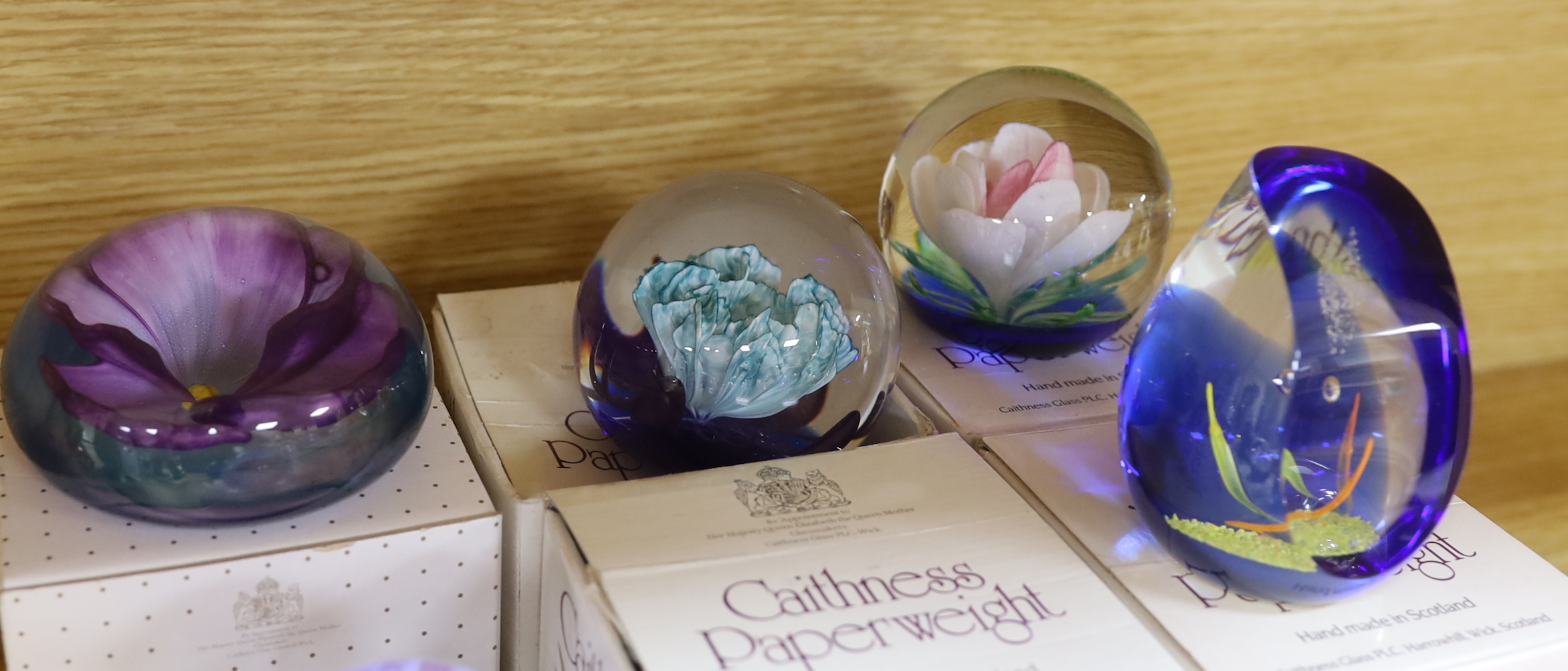 Ten Caithness paperweights, boxed, some limited edition